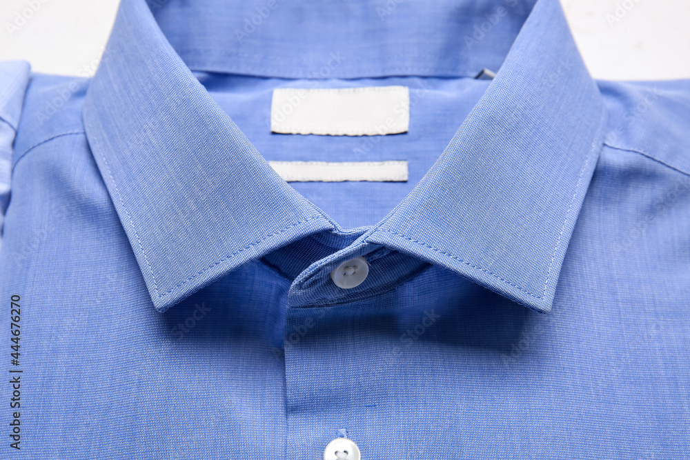 Stylish male shirt on light background