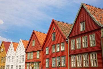 Colourful wooden houses of Bryggen the old wharf historic harbour district of Bergen, Norway. Its a Unesco World heritage listed and was rebuilt after being destroyed in a fine.