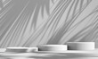© jarnbeer19 - 3D white product podium display with white background and tree shadow,summer product mockup background,3D render illustration