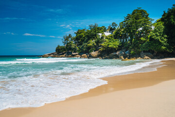 Wall Mural - Beautiful and wild lonely beach with rough granite rocks, white sand, palm trees in a jungle and turquoise water , bright sunny summer. Summer vacation and nature travel adventure concept.. Summer