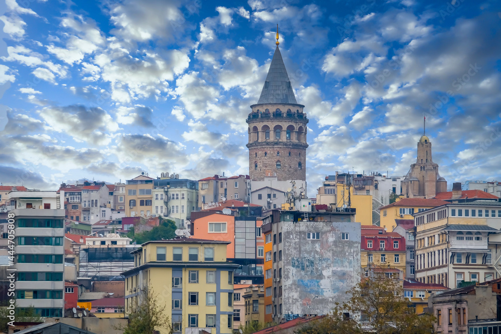 Galata tower and Beyoglu district old houses Istanbul city skyline in Turkey, Galata tower the street in the old town of Istanbul, Turkey - obrazy, fototapety, plakaty 