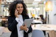© Rufino - Afro Business Woman Using Phone