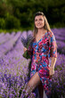 © Xalanx - Young woman in a lavender field at sunset