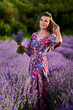 © Xalanx - Young woman in a lavender field at sunset