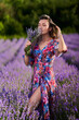 © Xalanx - Young woman in a lavender field at sunset