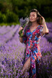 © Xalanx - Young woman in a lavender field at sunset