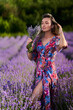 © Xalanx - Young woman in a lavender field at sunset