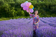 © Xalanx - Woman with balloons in a lavender field
