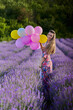 © Xalanx - Woman with balloons in a lavender field