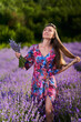 © Xalanx - Young woman in a lavender field at sunset