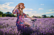 © Xalanx - Young woman riding her bicycle in a lavender field