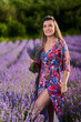 © Xalanx - Young woman in a lavender field at sunset