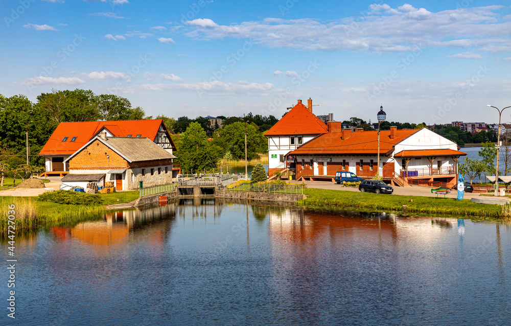 Ponds and reservoir facilities of traditional masurian fishing farm in Elk town of Masuria region in Poland - obrazy, fototapety, plakaty 