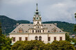 Velke Brezno, Bohemia, Czech Republic, 26 June 2021:  State chateau with turret on the roof, Neo-Renaissance castle surrounded by a park at sunny summer day