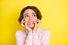 Photo Of Young Girl Bite Fingers Teeth Afraid Scared Panic Terrified Look Empty Space Isolated Over Yellow Color Background