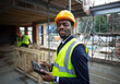 © Paul Bradbury/Caia Image - Portrait confident male architect at construction site