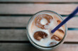Cold coffee drink, cooling frappe beverage with ice in hot summer weather, refreshment concept