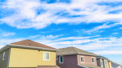 Wall Mural - Pano Two storey houses in a neighborhood looking out to the snowy Wasatch Mountains