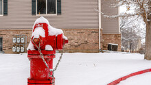 Pano Bright Red Fire Hydrant On The Roadside Of Community Covered With Snow In Winter