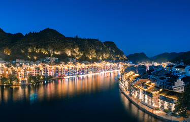 Wall Mural - Night view of Zhenyuan ancient town, Guizhou Province, China