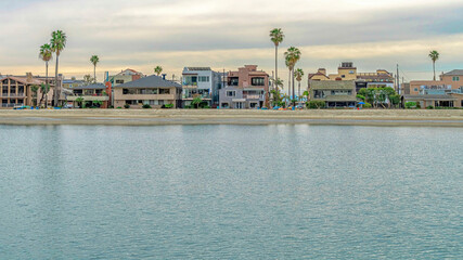 Canvas Print - Pano Scenic coastal neighborhood scenery in Long Beach California against cloudy sky