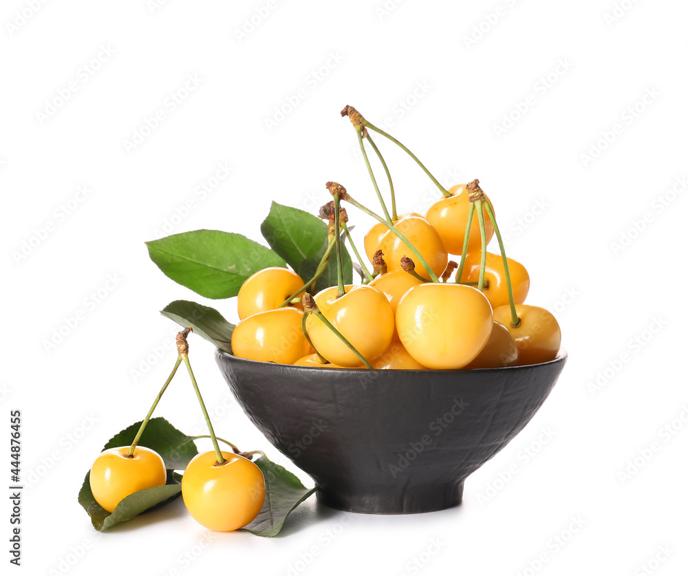 Bowl with tasty sweet cherries on white background