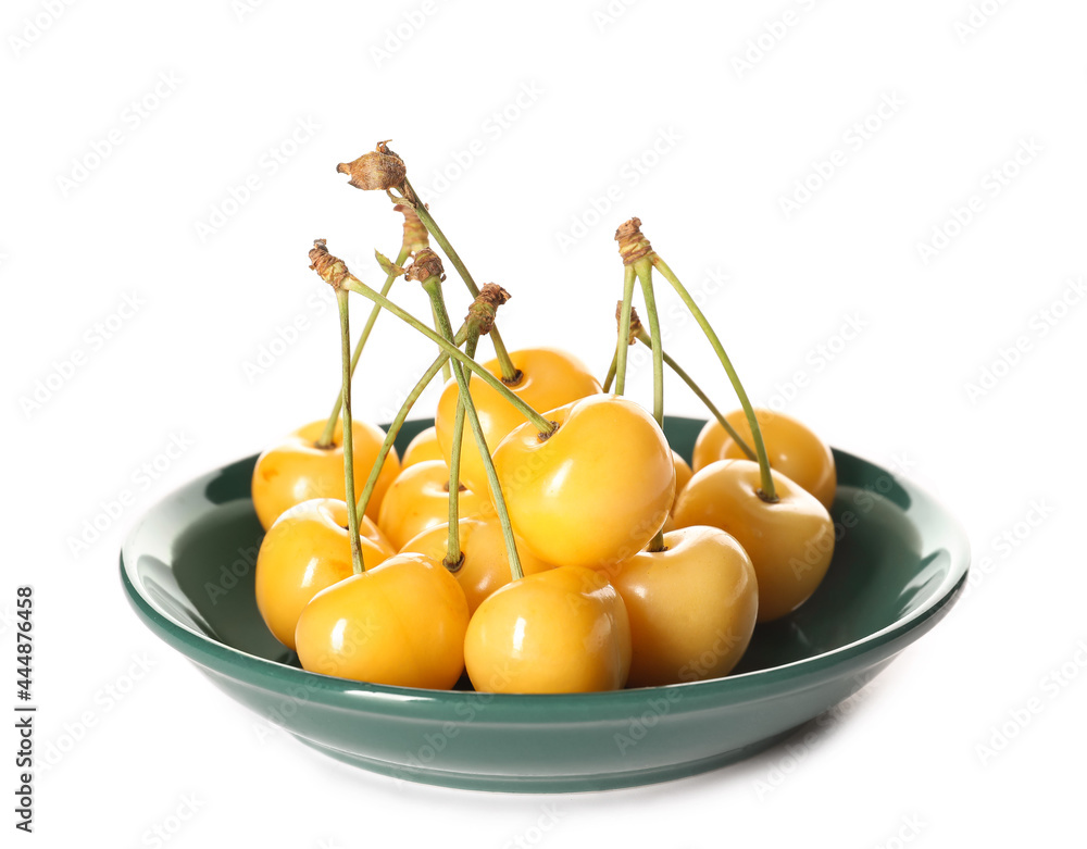 Plate with tasty sweet cherries on white background