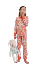 Poster - Cute girl wearing pajamas with toy on white background