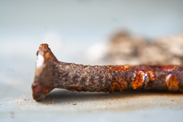 Poster - Closeup shot of a dark rusty nail