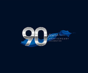 90th Years Anniversary celebration logotype silver colored with blue ribbon and isolated on dark blue background