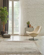 © UnitedPhotoStudio - Decorative living room concept with armchair lamp and carpet style, white brick wall background.