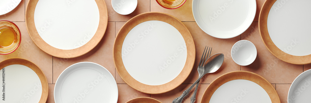 Mockup background for food stylist presentation. Top view of empty plates with tableware setting on beige terracotta background. 3d render illustration. Clipping path of each element included. - obrazy, fototapety, plakaty 