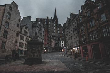 the historic buildings in the city of edinburgh, shot taken at twilight, looking like a ghost town