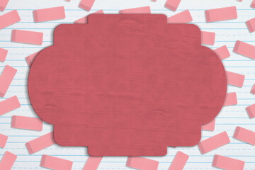 Wall Mural - Blank sign on pink eraser background on ruled paper
