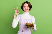 Photo Of Young Girl Happy Positive Smile Healthy Food Vegetables Salad Sho Okay Alright Ad Sign Isolated Over Green Color Background