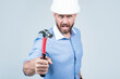 © be free - angry guy hold hammer. business project engineer. worker in hard hat. boss on construction site.