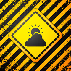 Black Sun and cloud weather icon isolated on yellow background. Warning sign. Vector
