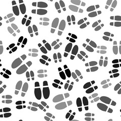 Poster - Black Footsteps icon isolated seamless pattern on white background. Detective is investigating. To follow in the footsteps. Vector