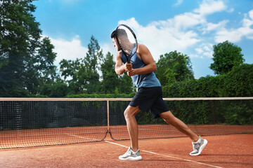 Sticker - Man playing tennis on court. Racket sport