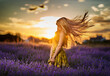 © Xalanx - Young woman in blooming lavender field