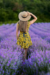 © Xalanx - Young woman in blooming lavender field