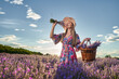 © Xalanx - Young woman in blooming lavender field