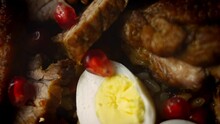 Taste Uzbek Cuisine Soulful Wedding Pilaf. It Is Beautifully Decorated With Eggs And Sausage. 4k Video