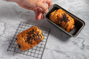 Poster - High angle shot of crunchy and appetizing pastry with sprinkles