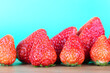 Fresh ripe strawberries on cutting board