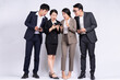 © Timeimage - Group of Asian business people posing on a white background