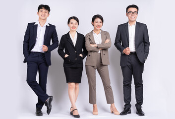 Wall Mural - Group of Asian business people posing on a white background