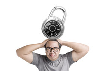 Asian Man In Eyeglasses With Unhappy Expression Pressed By Padlock