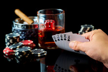 Casino Chips, Playing Cards, Glass Of Whiskey And Dices On Dark Reflective Background