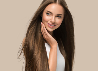 Beautiful woman with healthy smooth strong hair natural make up  beauty female young model